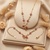 Ruby Ribbon Blossom Necklace & Bracelet Set – Anti Tarnish Gold Edition